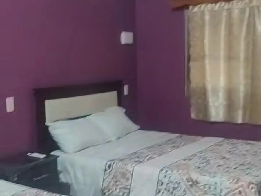 Recámara de Habitación Piedras Altas con cama matrimonial y aire acondicionado