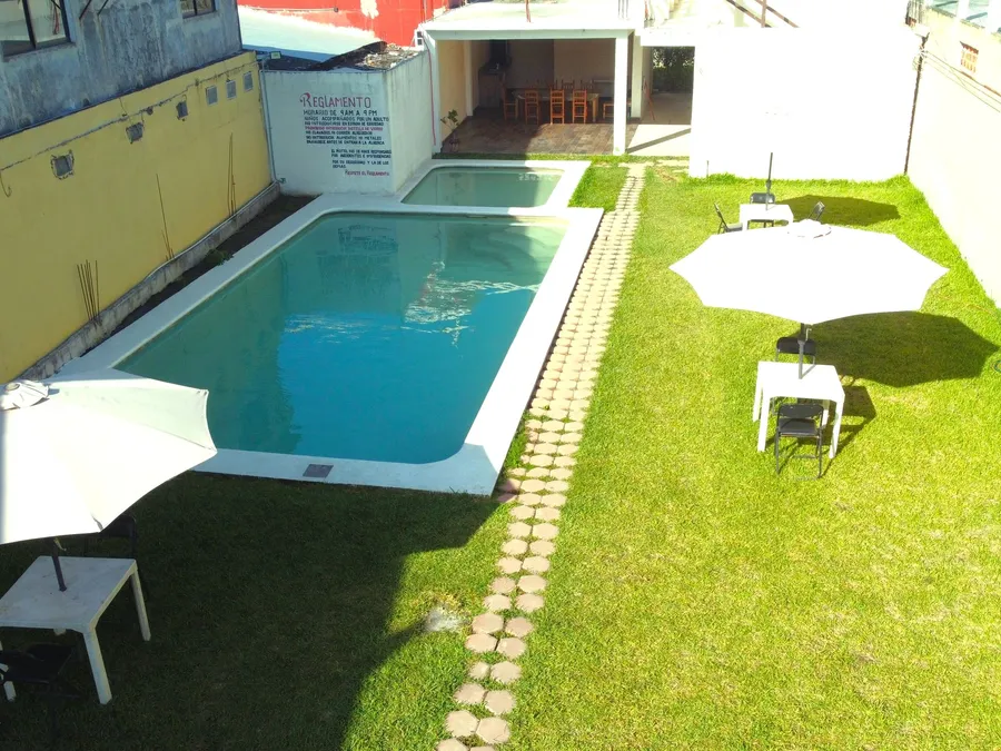 Vista aérea de Casa Xanath con alberca, chapoteadero, jardín y comedor techado
